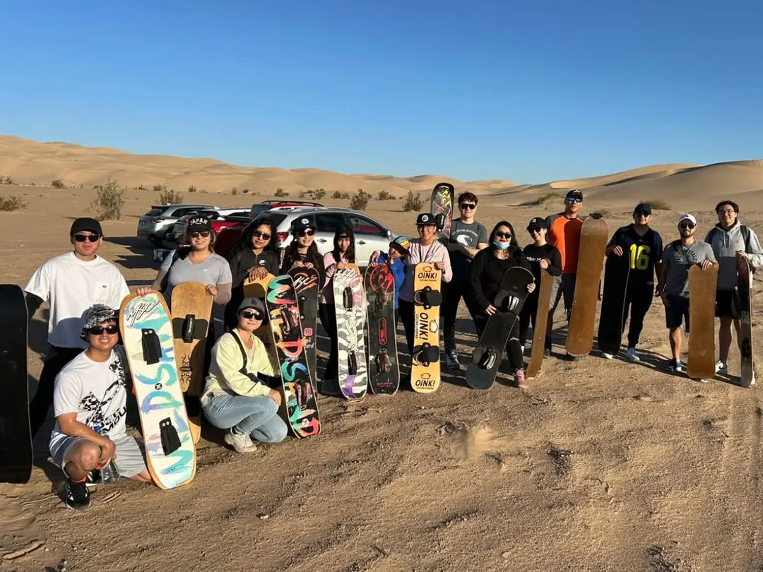 Sandboarding in Agadir desert dunes